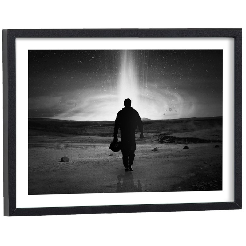 Affiche film Interstellar noir et blanc - silhouette face phénomène cosmique cadre bois noir